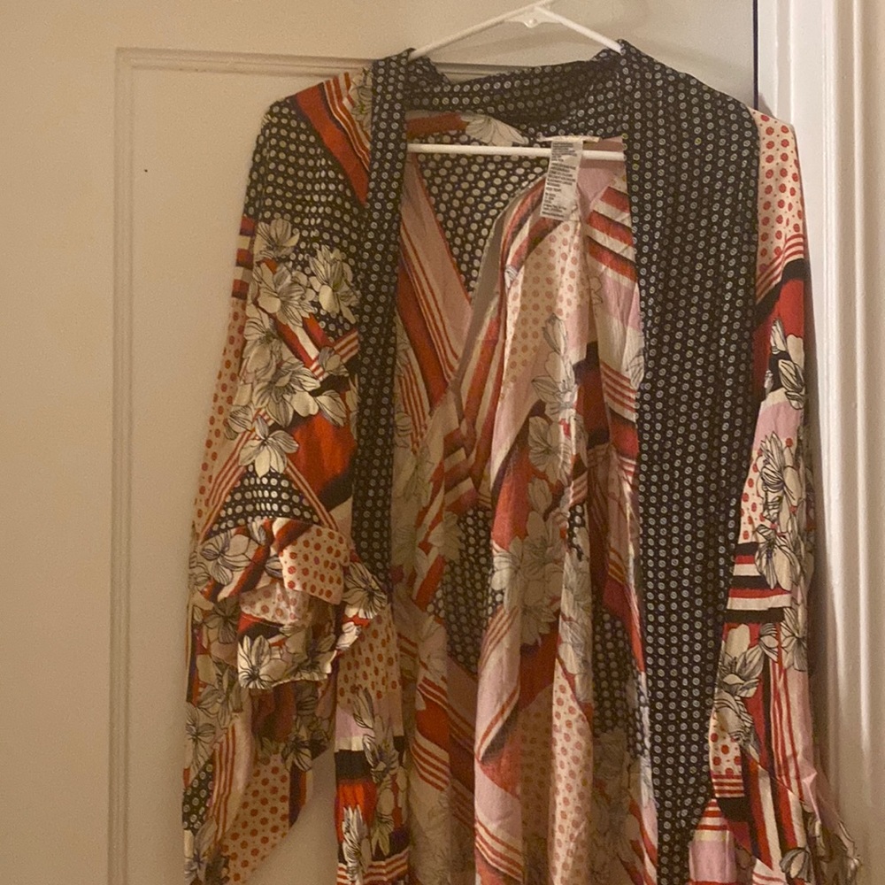 Cotten cover up, lots of fun patterns and colors, two styled in holes on back